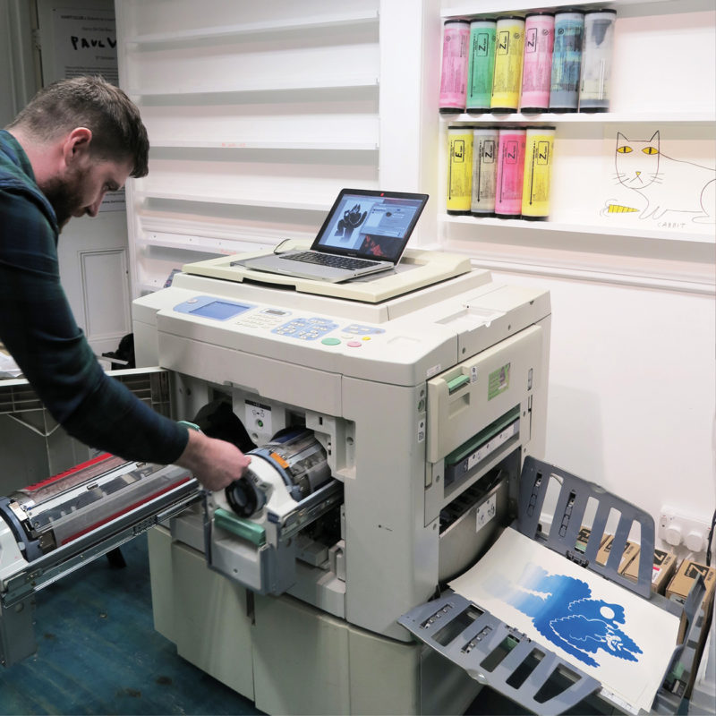 Printing begins on our Risograph machine.