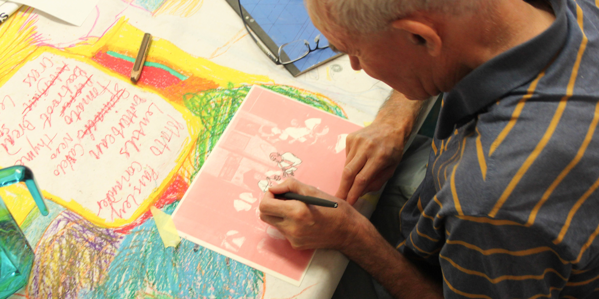 Hart School students prepare their drawings to be riso printed.